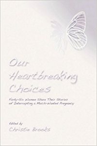 This image shows the cover of the book "Our Heartbreaking Choices..." which shows a monochromatic butterfly clear and defined on one side and fading out on the other.