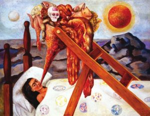 Kahlo, with her distinctive joined eyebrows, lies in a bed with white covers against a backdrop of barren rocky terrain, a hot sun burning in the sky. Above her is a rack on which are mounted organs, a human skull, and various meats and tissues. They are being funnelled into her mouth.